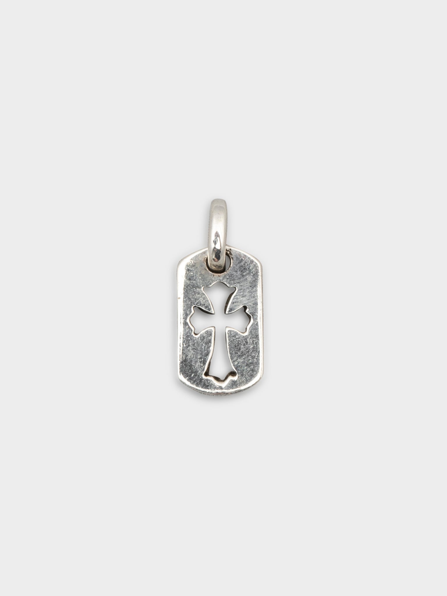 Buy Chrome Hearts Tiny Cross Cutout Dog Tag Pendant Online at Groupie