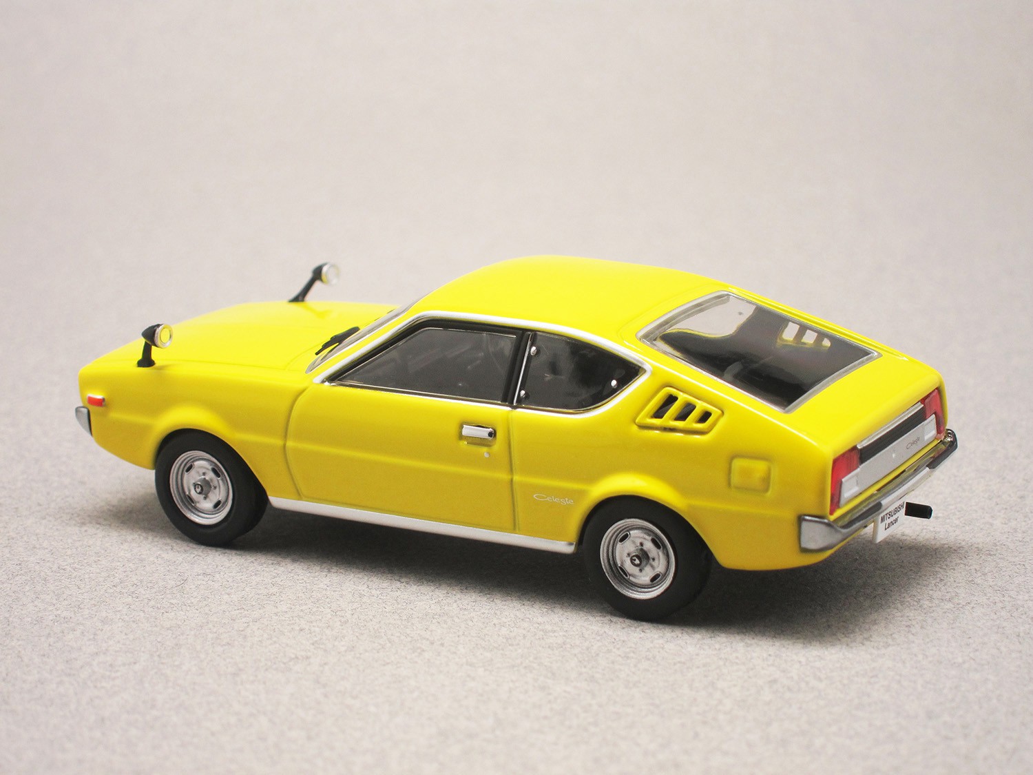 Mitsubishi Lancer Celeste yellow (First:43) 1:43 - Minicarweb