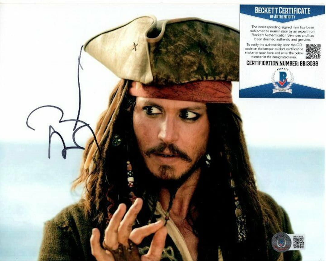 ジョニー・デップのサイン入り8x10パイレーツ・オブ・カリビアン