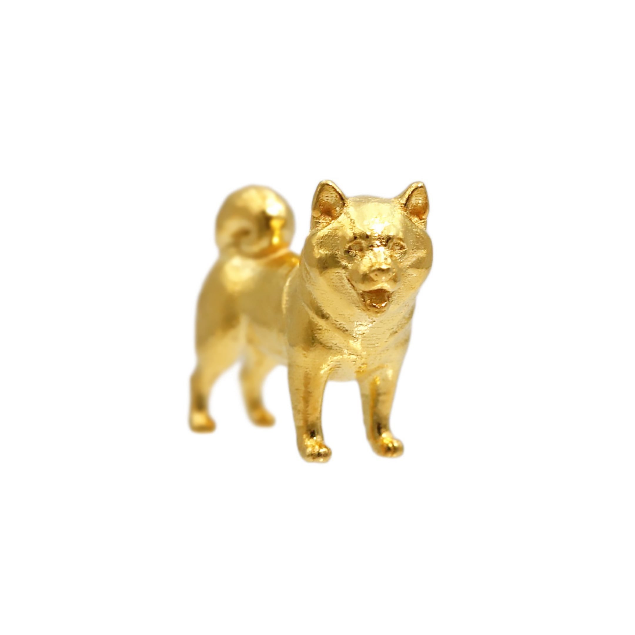金価格高騰中】日本の守護犬を黄金の純金で表現。忠誠と幸福を宿す指先
